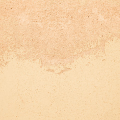 Light plastered wall for background. Close up detail. Toned