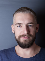 Fototapeta premium Portrait of a young man with a beard