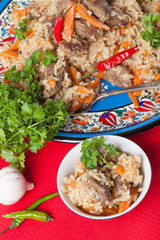 Hot delicious pilaf with dried fruits. Selective focus