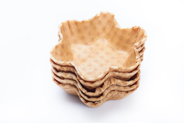 Set of tartlets empty on white background