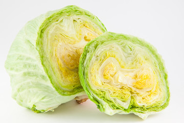 Obraz premium Crisphead lettuce (Lactuca sativa) isolated in white background