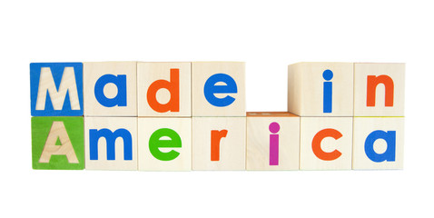 MADE IN AMERICA concept written with colorful alphabet blocks. Isolated.
