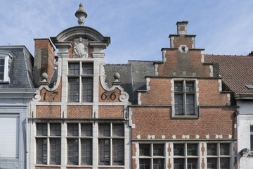 Medieval tiled roofs and windows in the historical center of Ghent, Belgium, in the beginning of...