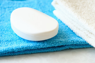 Obraz na płótnie Canvas A piece of soap on a towel