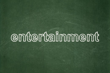 Holiday concept: Entertainment on chalkboard background