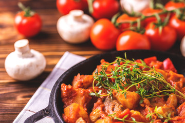 Traditional goulash soup close-up on  wooden table. Ingredients.