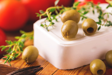Greek cheese feta with thyme and green olives