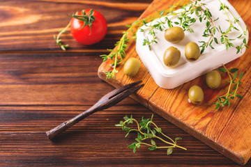 Greek cheese feta with thyme and green olives