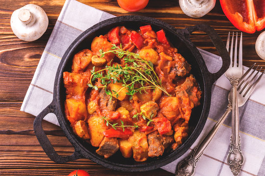 Traditional goulash soup close-up on  wooden table. Ingredients.