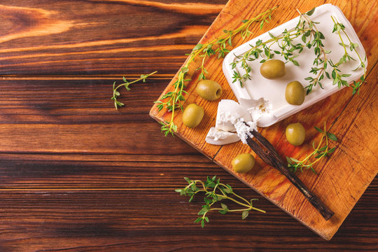 Greek cheese feta with thyme and green olives