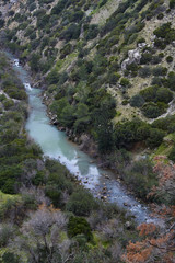 Fototapeta na wymiar Guadalhorce river flowing through the protected area of Desfiladero de los Gaitanes
