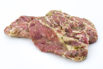 Pork chop, marinated. Isolated on the white background.