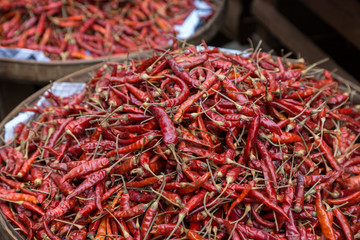 Fototapeta premium Close-up of a heap of dried chilies in a basket.
