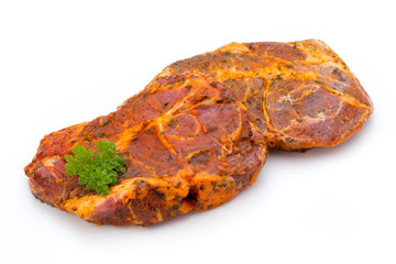 Pork chop, marinated. Isolated on the white background.