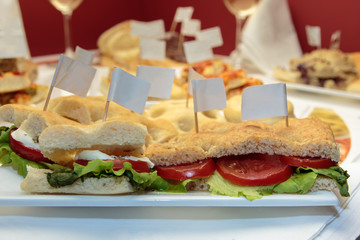 Italian Bread Wedges filled with Tomato, Fresh Cheese and Green Salad