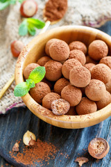 Homemade chocolates with a filling of hazelnuts.