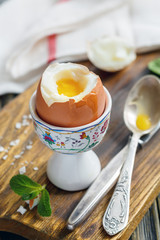 Soft-boiled egg on the stand for breakfast.