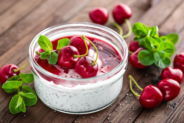 Fresh yogurt with cherry and chia seeds, delicious dessert for healthy breakfast