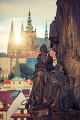 Beautiful morning at Charles bridge with its statuette in autumn time