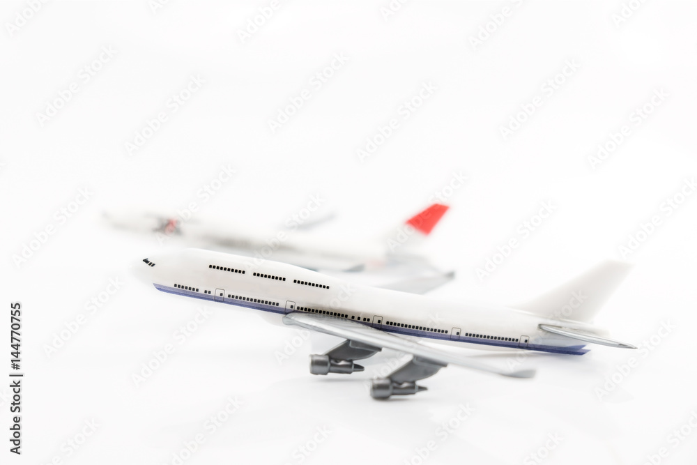 Wall mural toy airplane / plastic toy airplane on white background.