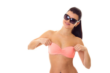 Woman in swimming suit with sunglasses