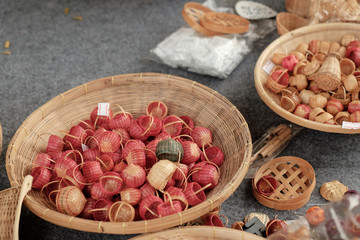 Basketry / View of small baskets in wooden container.