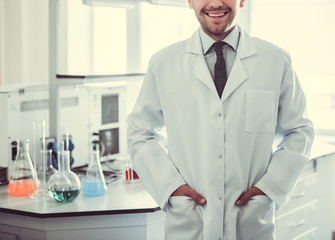 Handsome doctor in laboratory