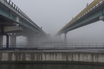 bridge over Vistula river in Krakow in heavy fog.