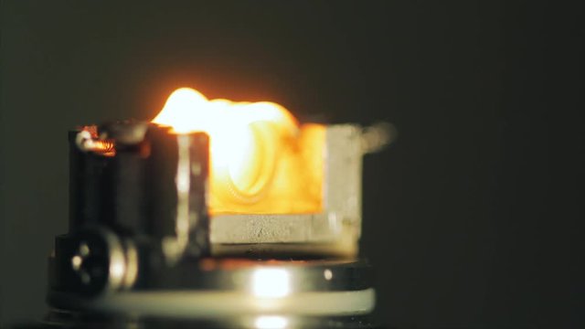 Regulating electronic cigarette coils. Vape after-sales service. Glowing spirals of the e-cigarette. Macro view. 4k