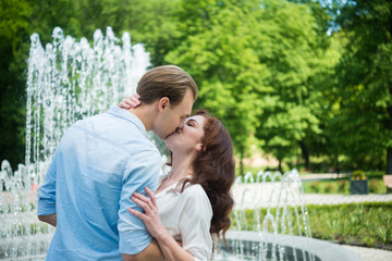 Fototapeta premium Couple kissing outdoors