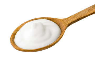 White Yogurt on Wooden Spoon Isolated on White Background