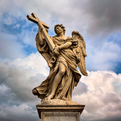Fototapeta na wymiar Angel with the Cross on Aelian Bridge in Rome, Italy