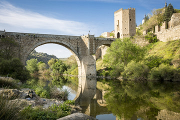 Fototapeta na wymiar Puente de San Martín bridge over Tagus river in Toledo, Spain