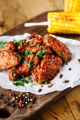 Chicken wings in hot sauce