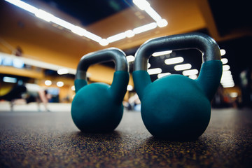 Naklejka na ściany i meble set of weights and a dumbbell for sporting crossfit and fitness in the gym. Sports Equipment.high contrast and monochrome color tone.