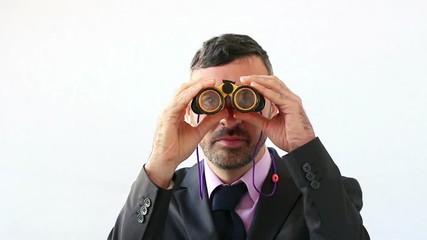 businessman with binocular foresee the future - Powered by Adobe