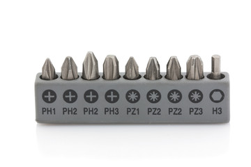 Set of screw terminals in gray container isolated on white background