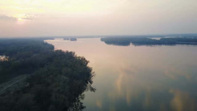 Flight over the Dnieper River at sunset in early spring. Auric survey