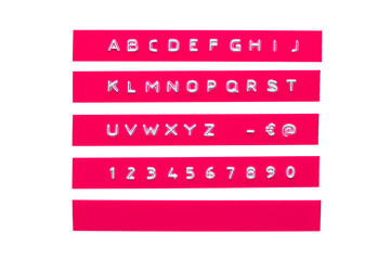 embossed alphabet on pink plastic tape, isolated on white
