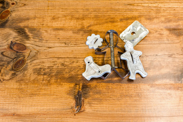 Tin Cookie Cutters Sitting on Wooden Table