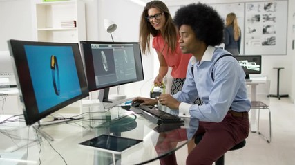  Portrait of smiling worker at technology design company