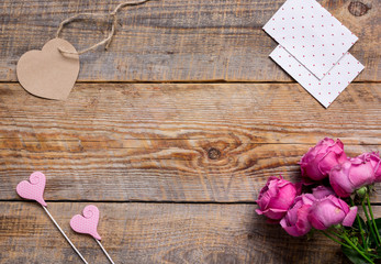 Present for woman with peony and greeting-card top view space for text