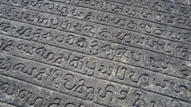 Ancient inscriptions on the Gal Pota in Polonnaruwa, Sri Lanka