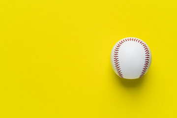 baseball on yellow background