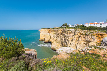 Fototapeta na wymiar Algarve beautiful turquoise cost in Portugal