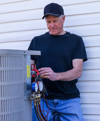 HVAC Technician Repairing Air Conditioner