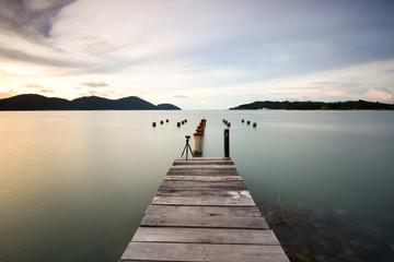 Fototapeta premium Long exposure shot of old pier at seascape