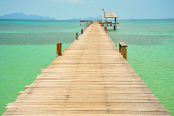 Fototapeta premium Beach on Tropical Islands with Wooden Piers