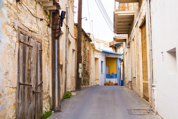 Beautiful view of scenic narrow alley with historic traditional houses in an old town in Europe