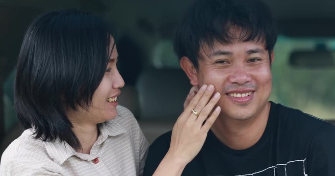 Asian Couple in love make fun in car